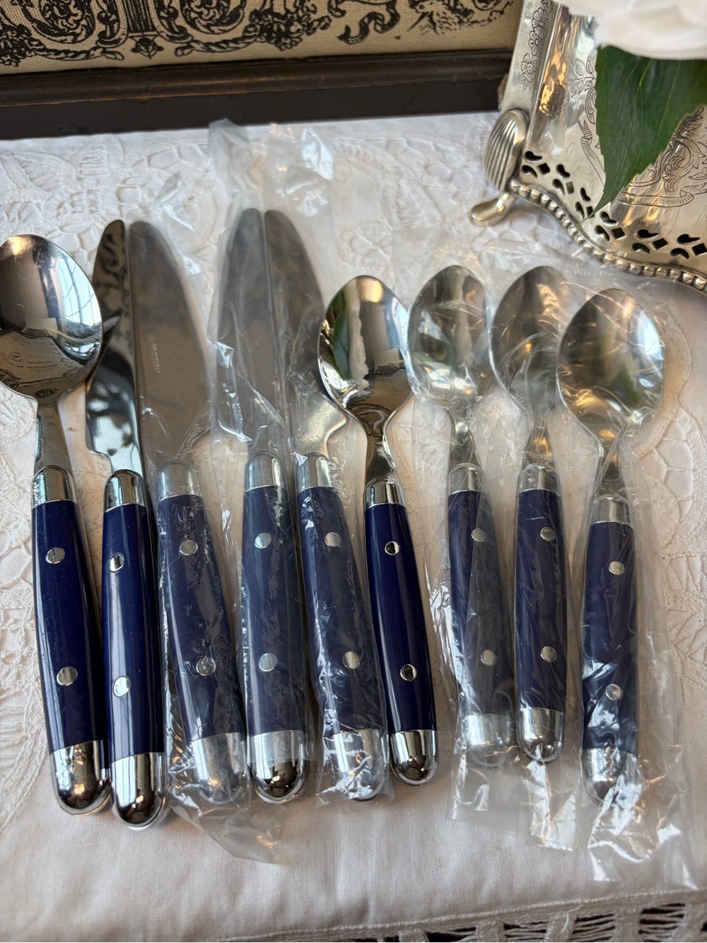 Blue & silver flatware set spoons and knives